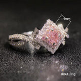 Cross-Wrapped Zircon Diamond Ring
