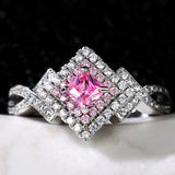 Cross-Wrapped Zircon Diamond Ring