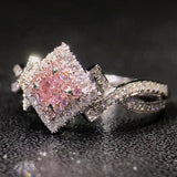 Cross-Wrapped Zircon Diamond Ring
